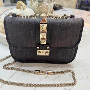 Valentino Glam Lock bag in a black /grey denim color
